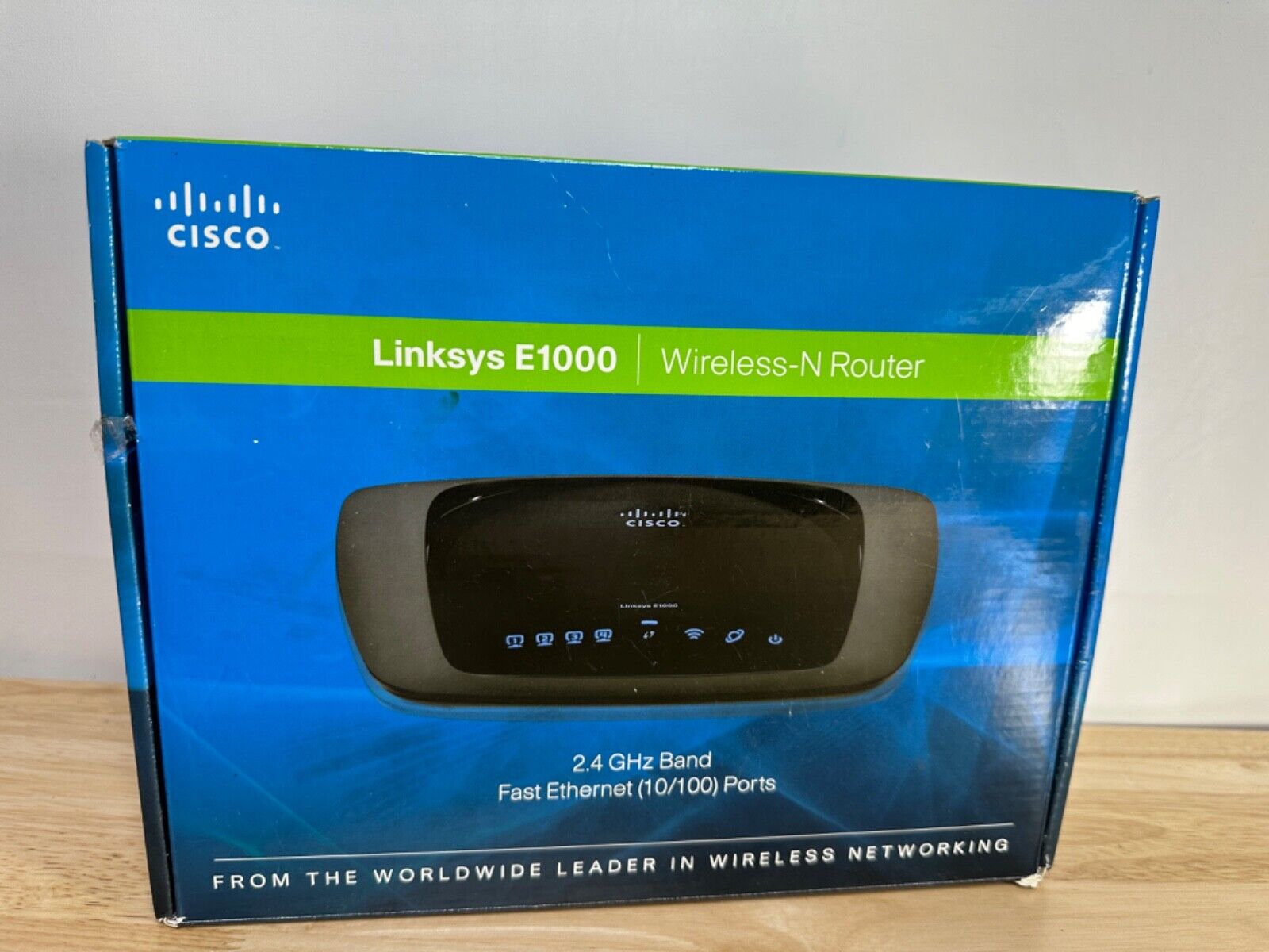 Cisco Linksys E1000 300 Mbps 4-Port 10/100 Wireless N G Router