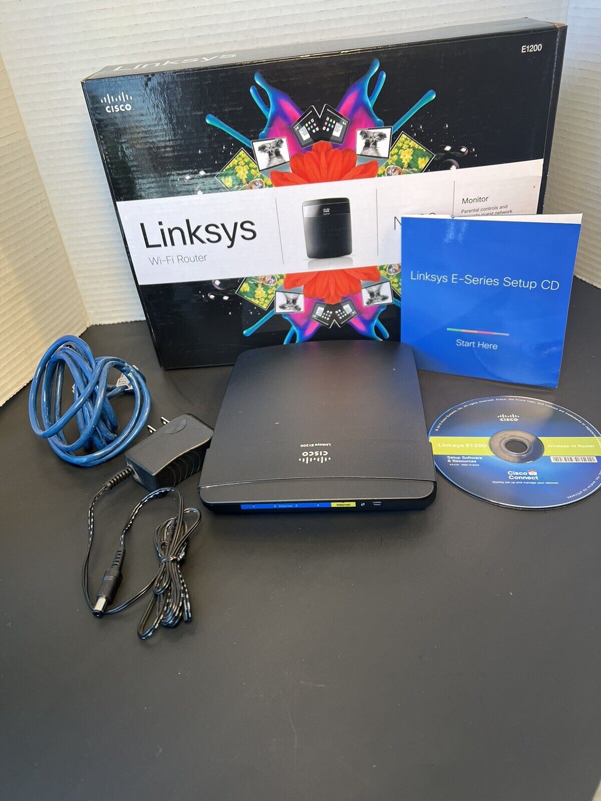 Linksys E1200 300 Mbps 4-Port 10/100 Wireless N Router With box