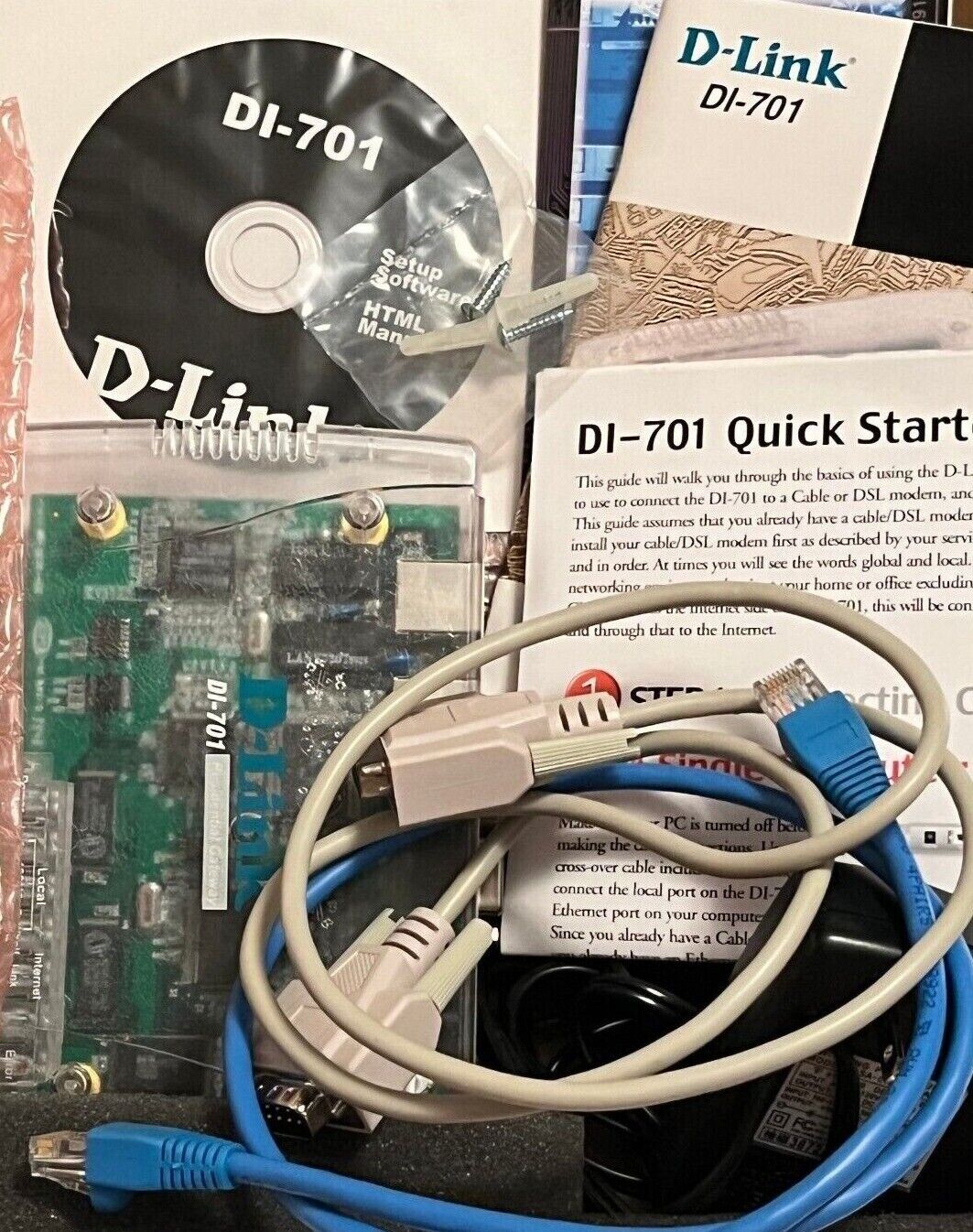 D-Link DI-701 Cable/DSL Internet Sharing Router: Has all components and docs